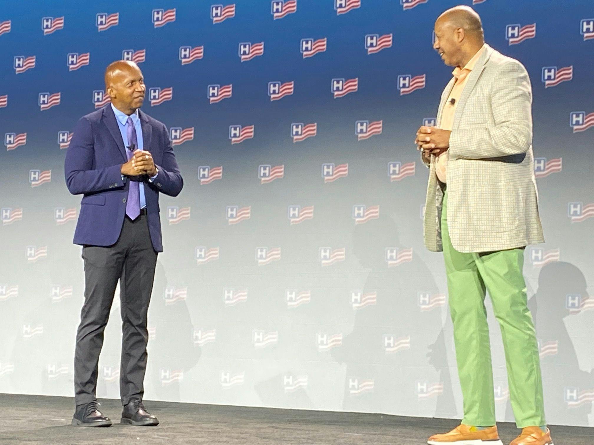 Bryan Stevenson, left, a lawyer and social justice activist, talked about health equity at the American Hospital Association's Leadership Summit in San Diego Sunday. Wright Lassiter, CEO of the Henry Ford System and chairman of the AHA's Board of Trustees, said the health system must do better.
